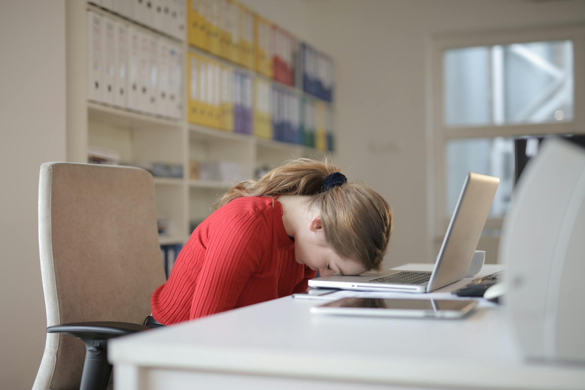 a person tired at their computer